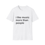 A white short-sleeve crewneck t-shirt with the phrase 'i like music more than people' printed in black lowercase sans-serif text across the chest, shown on a plain white background.